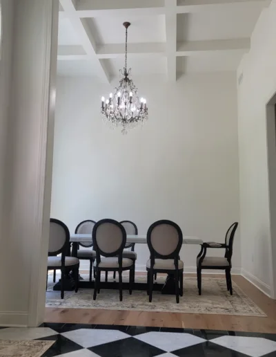 A black and white checkered floor in a dining room.
