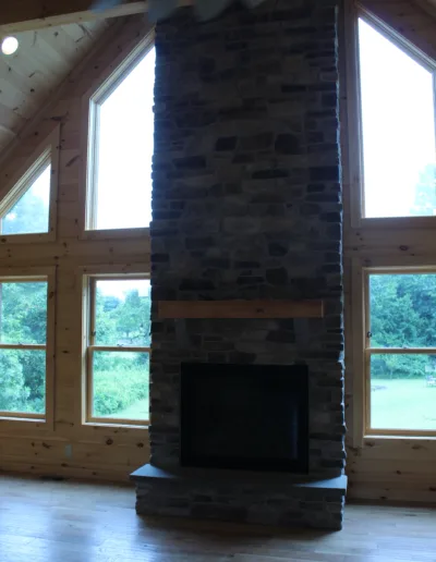 A fireplace in the middle of a room.