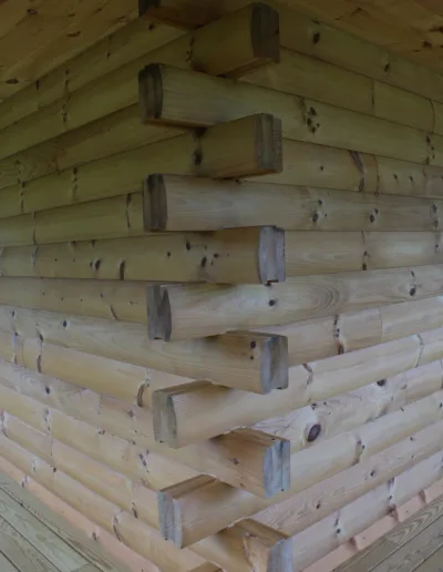 A wooden cabin with a wooden floor.