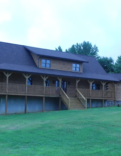 A large log home on a large lot.
